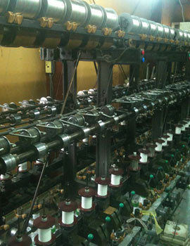 Each piece is closely wound around core thread in spiral