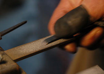 Each piece is closely wound around core thread in spiral