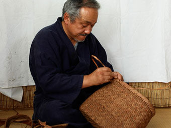 A basket bag made from Japanese wild grape vines that becomes shinier with use