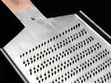 Double sided battledore shaped grater NO4